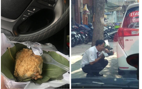 Người tài xế ngồi xổm ăn vội gói xôi bên đường và câu hỏi xót xa: "Lương tháng này bao nhiêu?"