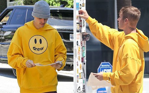 Justin Bieber hết thời tự thân xuống đường phát tờ rơi?